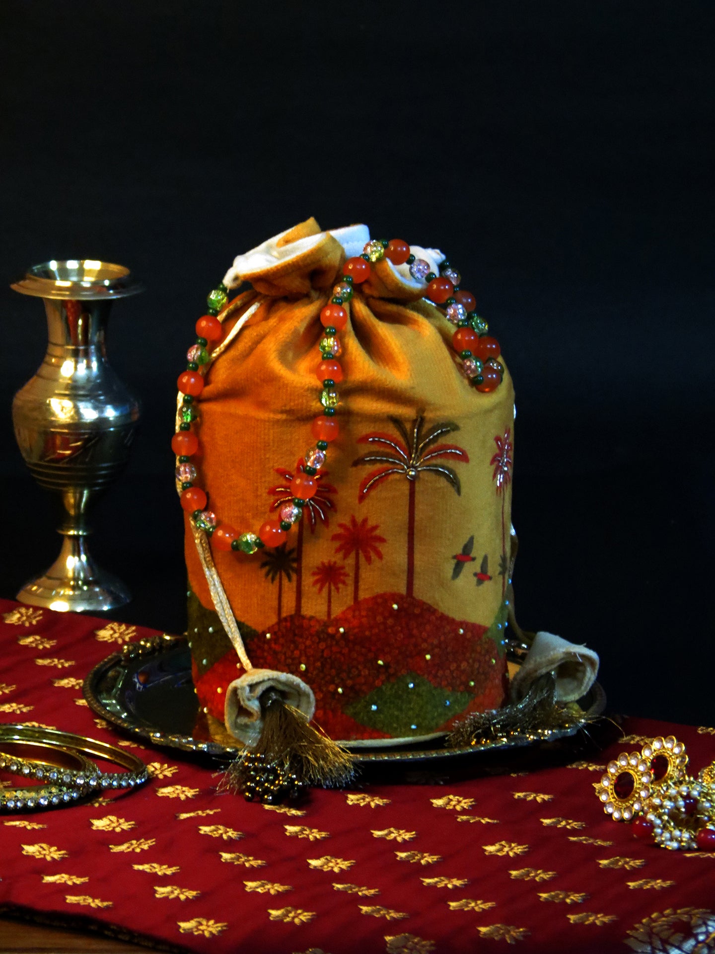 Sunset Orange Velvet Potli Bag with Beaded Handle and Palm Embroidery