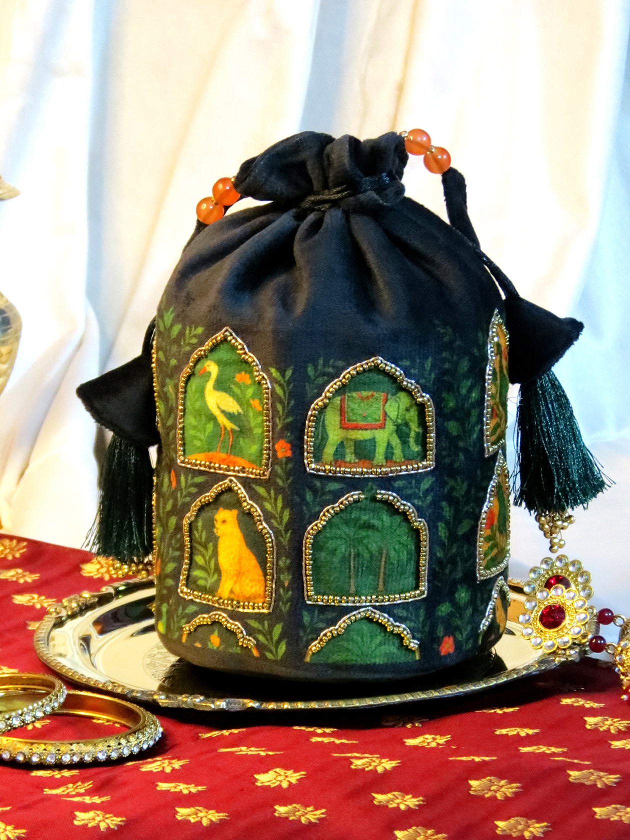 Printed and Hand-Embroidered Jharokha Majesty Potli Bag On Black Velvet