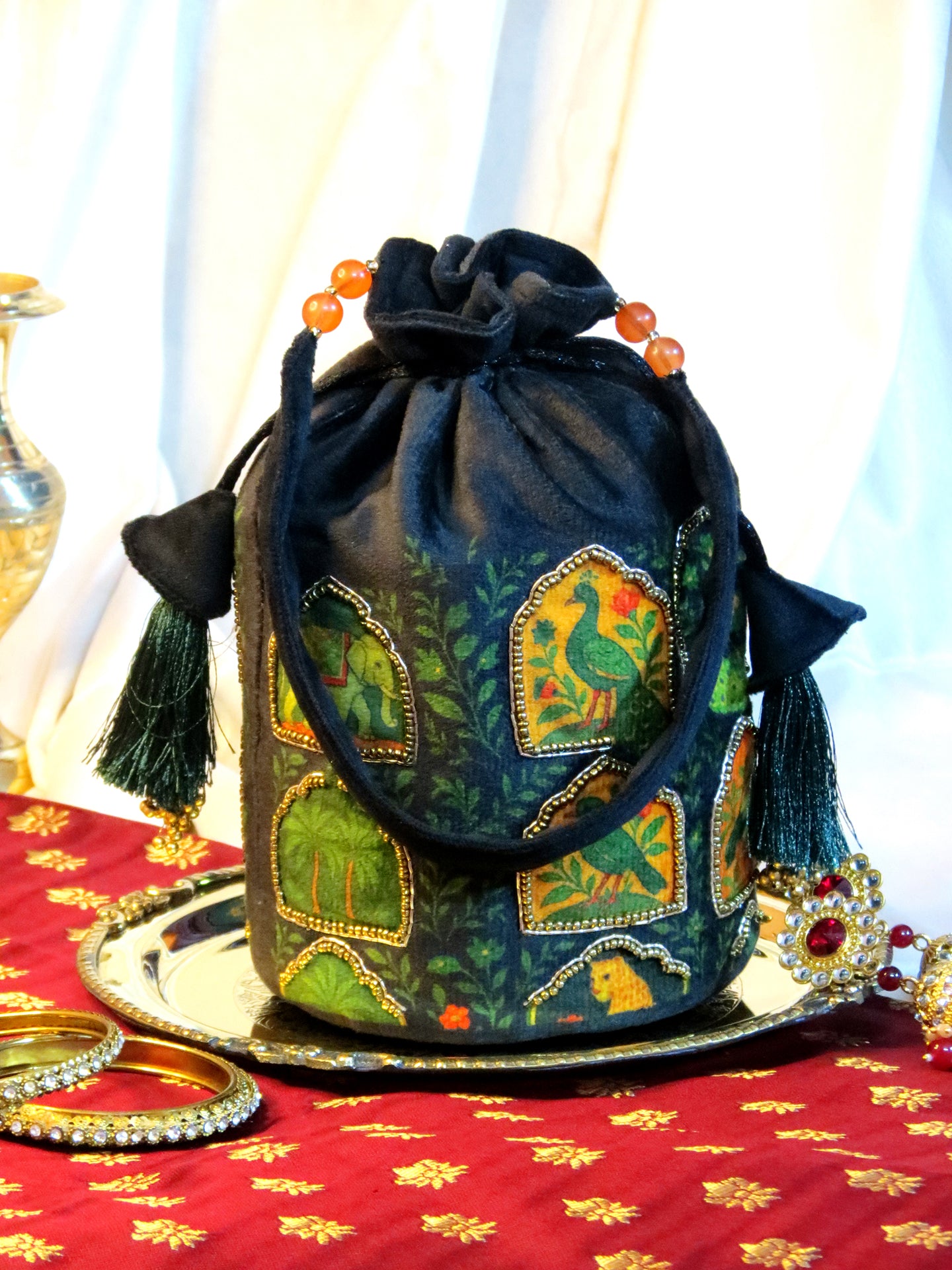 Printed and Hand-Embroidered Jharokha Majesty Potli Bag On Black Velvet